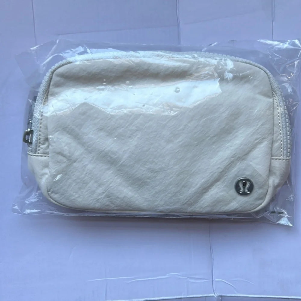 Everywhere Belt Bag 1L Wordmark Color